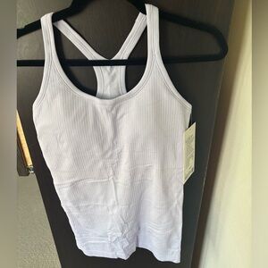 Lululemon Ebb to Street to Tank in Lavender Frost (LFRS)
Size 8